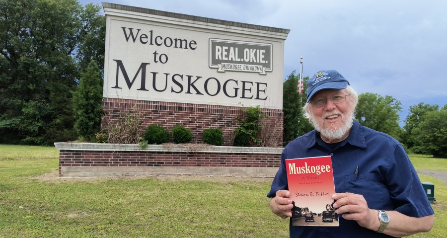 Me with book and sign